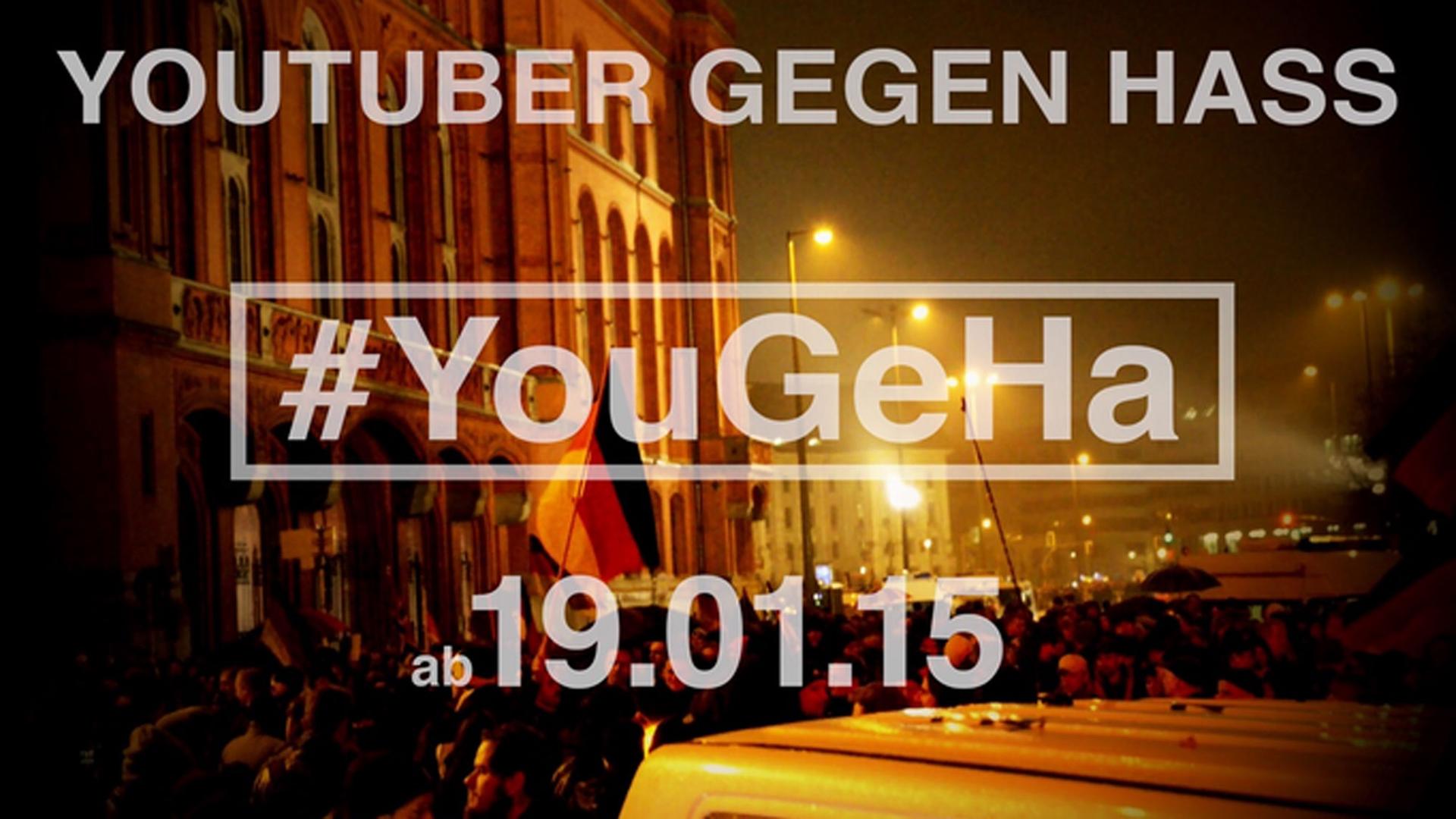 Screenshot des offiziellen #YouGeHa-Trailers. Schrift auf dem Foto von einer Pegida-Demonstration: Youtuber gegen Hass - #YouGeHa - am 19.01.15 Screenshot des offiziellen #YouGeHa-Trailers. Schrift auf dem Foto von einer Pegida-Demonstration: Youtuber gegen Hass - #YouGeHa - am 19.01.15