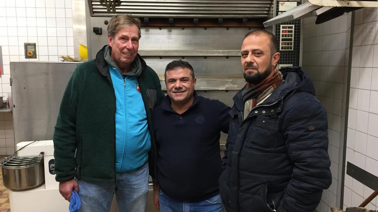 Michael Ratjen mit den zwei Bäckern aus dem Irak Michael Ratjen mit den zwei Bäckern aus dem Irak