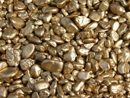 Ein Haufen glänzender Goldnuggets