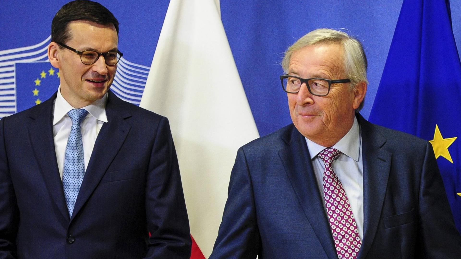 EU-Kommissionspräsident Jean-Claude Juncker und der neue polnische Premierminister Matheusz Morawiecki bei einem Treffen in Brüssel am 9.1.18