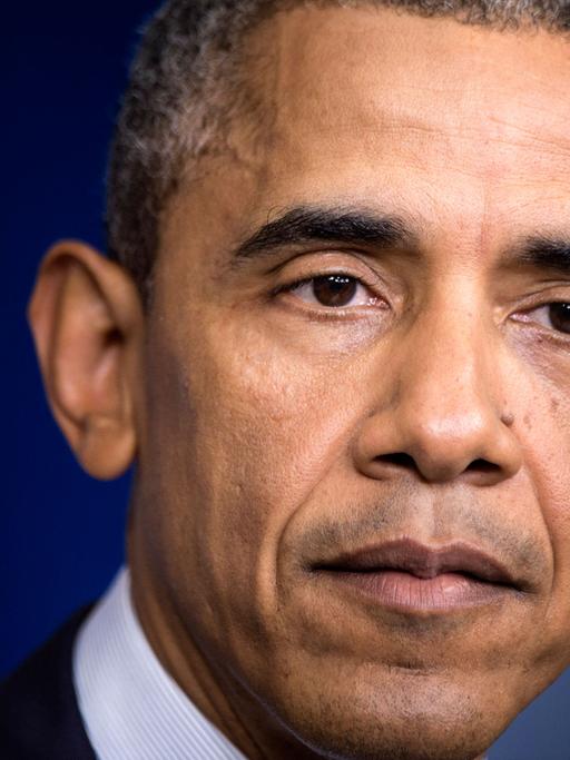 US-Präsident Barack Obama schaut nachdenklich während einer Pressekonferenz im Weißen Haus in Washington am 01.08.2014.