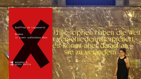 Treppenhaus der Humboldt-Universität in Berlin mit dem Satz von Karl Marx: "Die Philosophen haben die Welt nur verschieden interpretiert, es kommt aber darauf an, sie zu verändern."
