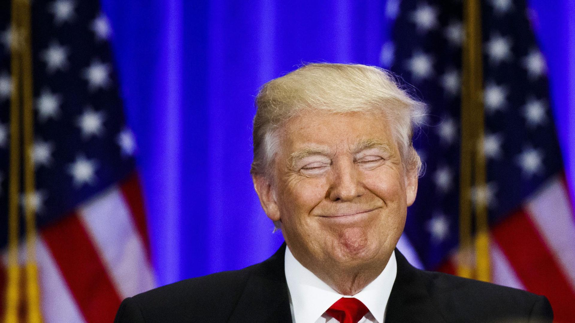 Donald Trump mit breitem Grinsen während einer Rede im Trump SoHo Hotel am 22.6.2016 in New York Donald Trump mit breitem Grinsen während einer Rede im Trump SoHo Hotel am 22.6.2016 in New York