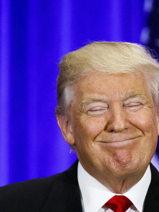 Donald Trump mit breitem Grinsen während einer Rede im Trump SoHo Hotel am 22.6.2016 in New York