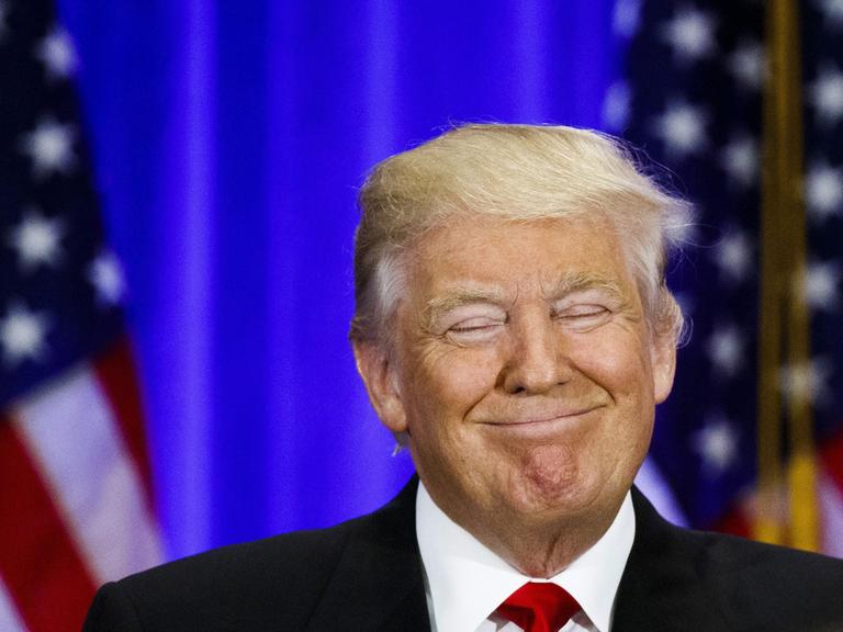 Donald Trump mit breitem Grinsen während einer Rede im Trump SoHo Hotel am 22.6.2016 in New York