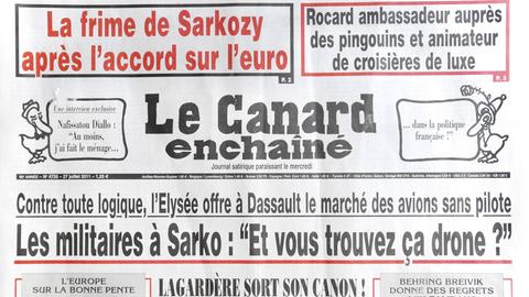 Die französische satirische Wochenzeitung Le Canard Enchaîné (Ausgabe vom 27.07.2011).