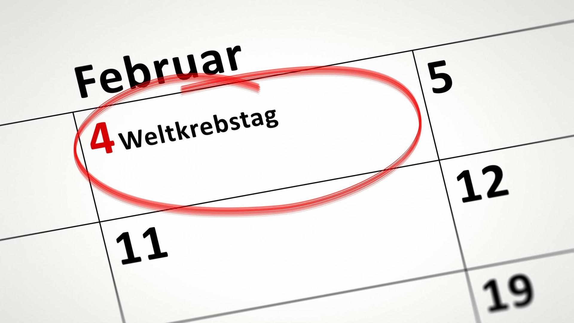 Kalenderblatt, auf dem der Weltkrebstag markiert ist, Deutschland Kalenderblatt, auf dem der Weltkrebstag markiert ist, Deutschland