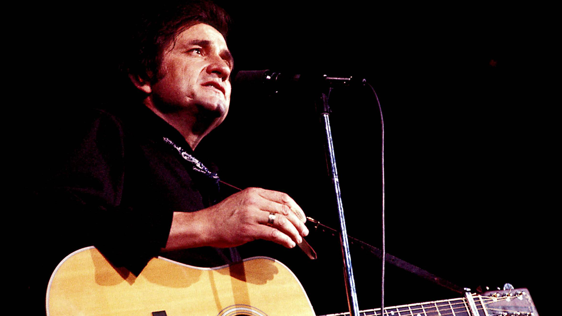 Johnny Cash während eines Konzertes Johnny Cash während eines Konzertes