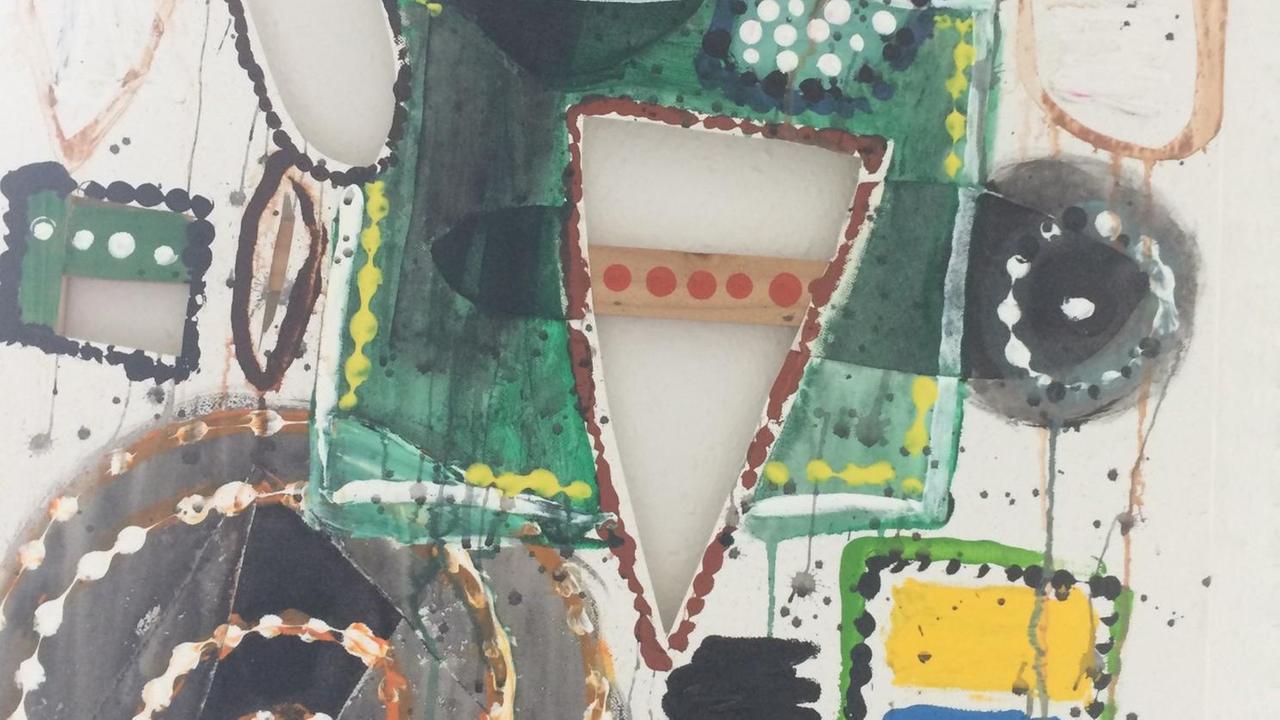 Ein Bild auf einer zerschnittenen Leinwand, Farben und Kreise Ein Bild auf einer zerschnittenen Leinwand, Farben und Kreise