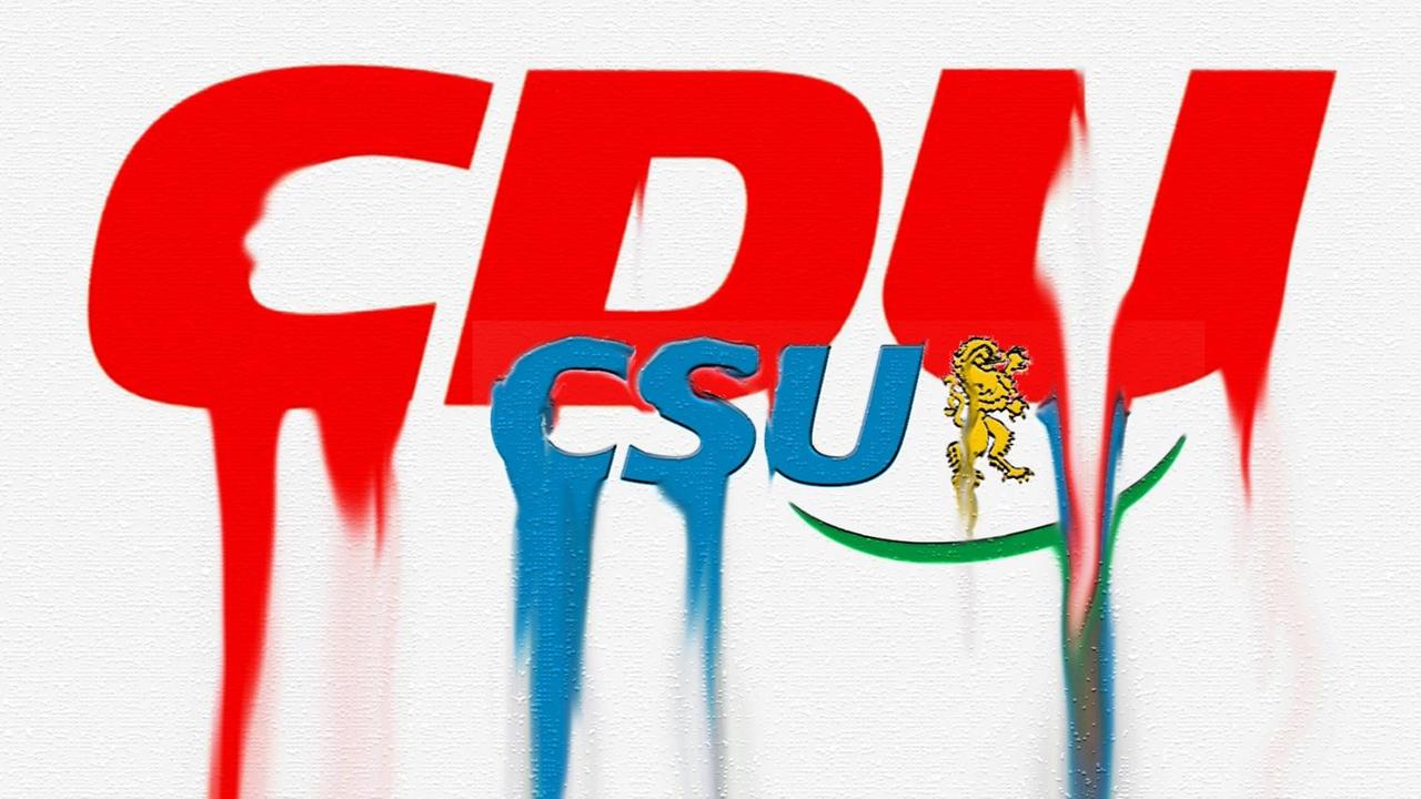 Das Logo der Christlichen Schwesterparteien zerfließt. Gemalt in Köln am 05.09.2013. Das Logo der Christlichen Schwesterparteien zerfließt. Gemalt in Köln am 05.09.2013.