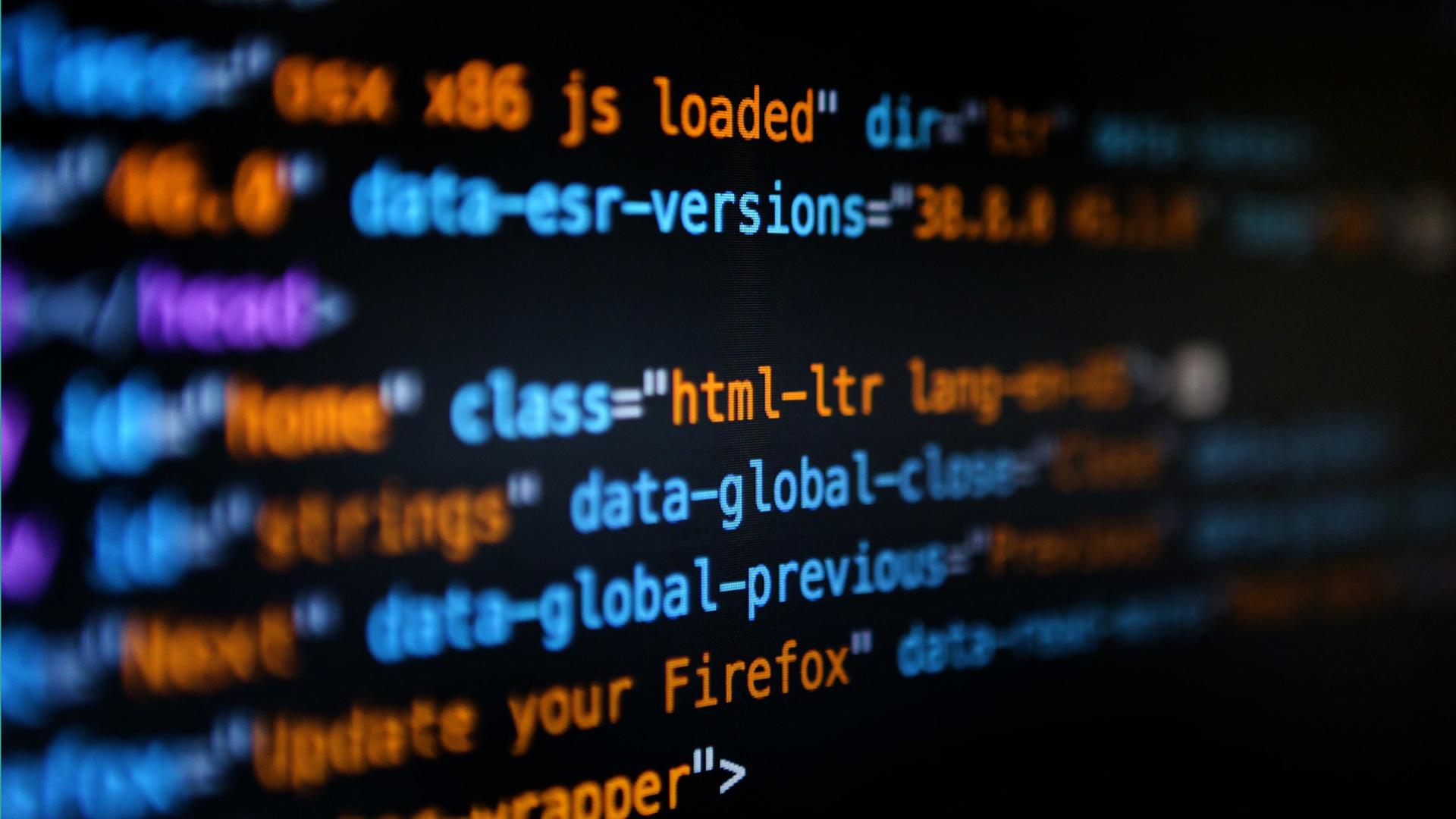 Ein Ausschnitt aus einem Computerbildschirm in der Nahaufnahme, darauf sind einzelne Befehle der Programmiersprache HTML zu sehen. Ein Ausschnitt aus einem Computerbildschirm in der Nahaufnahme, darauf sind einzelne Befehle der Programmiersprache HTML zu sehen.