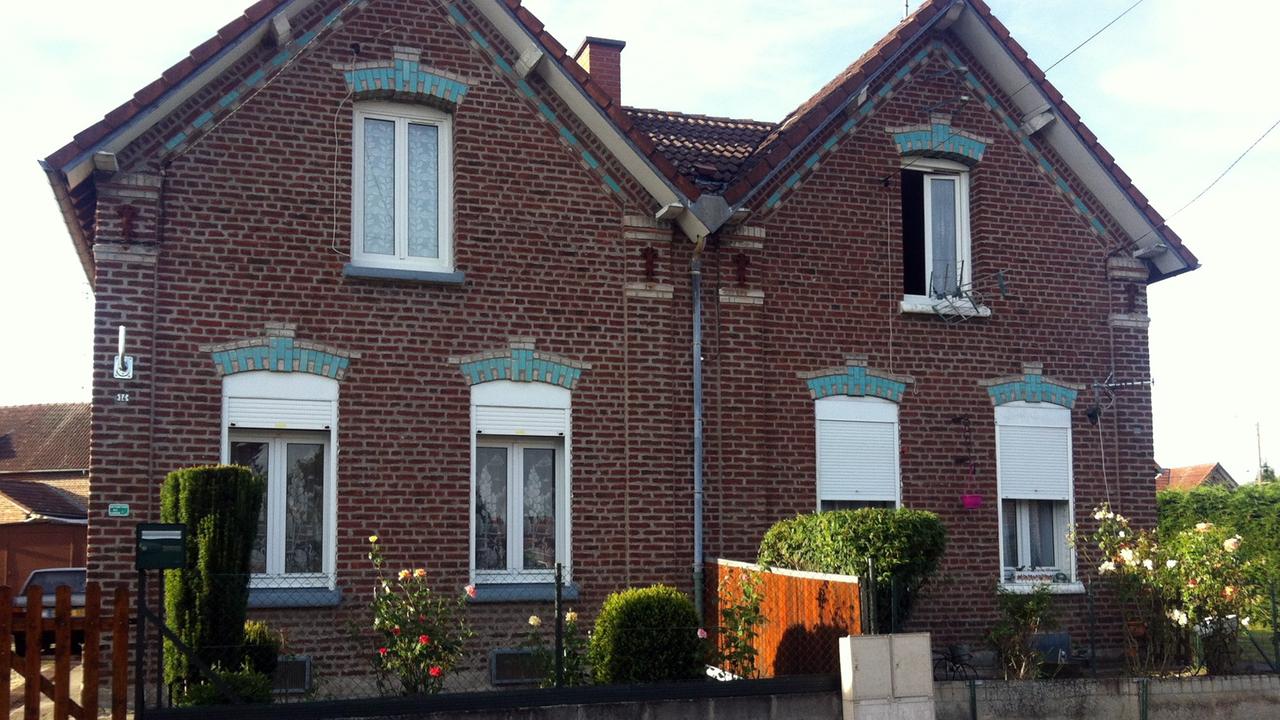 Typische Wohnhäuser in der ehemaligen Bergarbeitersiedlung Sabatier in Raismes (Nordfrankreich). Typische Wohnhäuser in der ehemaligen Bergarbeitersiedlung Sabatier in Raismes (Nordfrankreich).