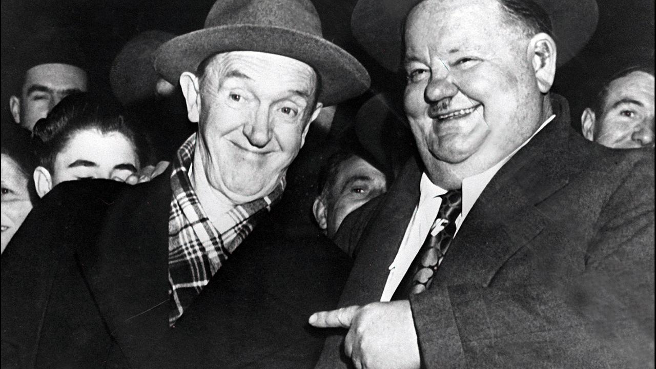 Die amerikanischen Komiker Oliver Hardy (r) und Stan Laurel Die amerikanischen Komiker Oliver Hardy (r) und Stan Laurel
