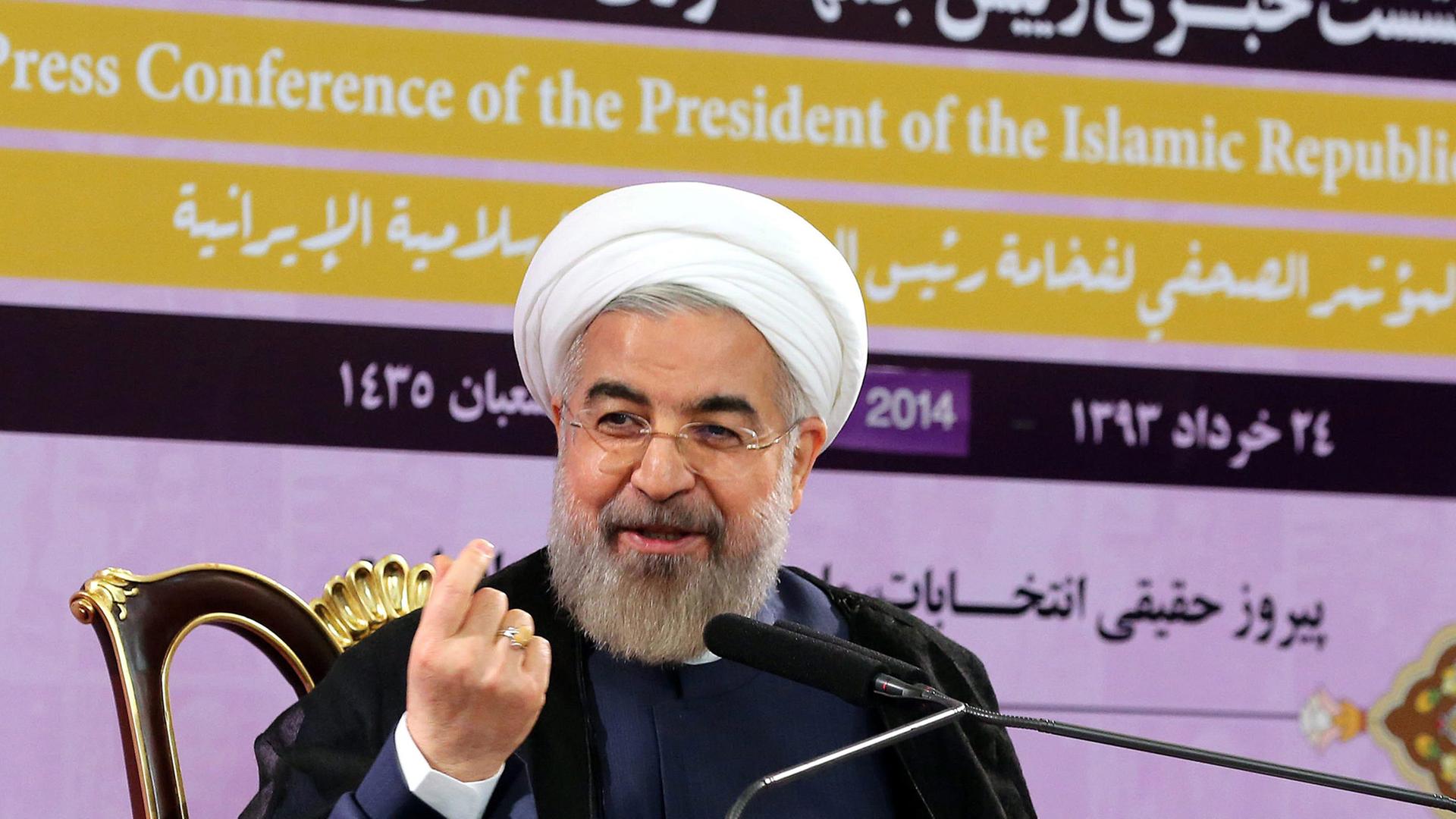 Blick auf Irans Präsident Hassan Ruhani bei einer Pressekonferenz. Blick auf Irans Präsident Hassan Ruhani bei einer Pressekonferenz.