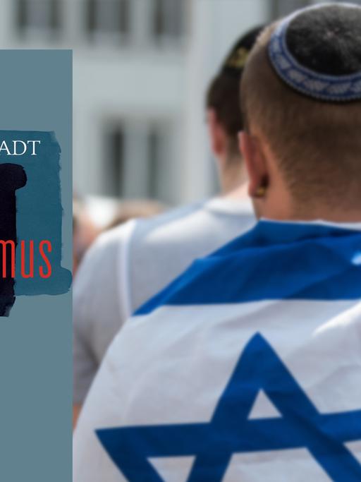 Ein Mann hat eine Israelfahne über seine Schultern gelegt und trägt eine Kippa