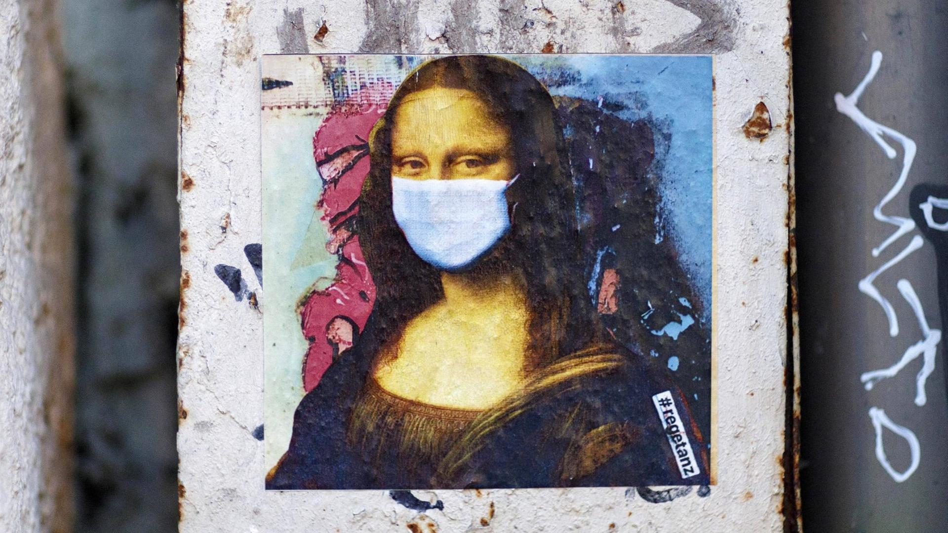 Sticker Kölner Künstlerin Ursula Düster zeigt eine Mona Lisa mit Mundschutz Sticker Kölner Künstlerin Ursula Düster zeigt eine Mona Lisa mit Mundschutz