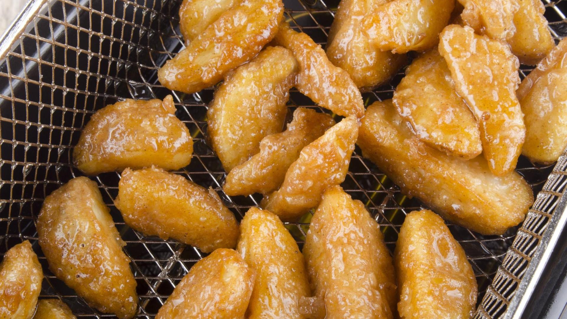 Kartofell Wedges aus der Friteuse Kartofell Wedges aus der Friteuse