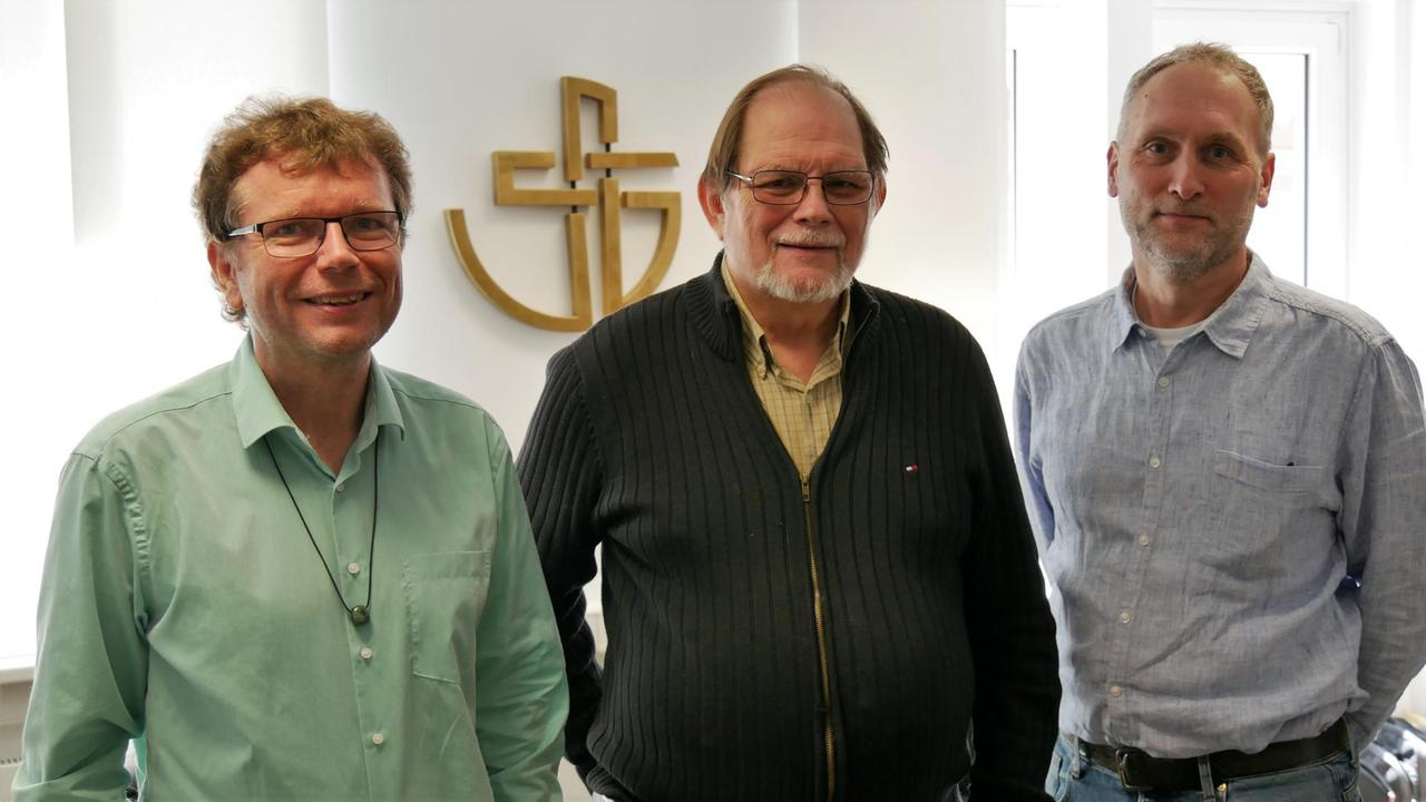 Hanns Lessing, Chris Ferguson und Philip Tanis von der Weltgemeinschaft Reformierter Kirchen
