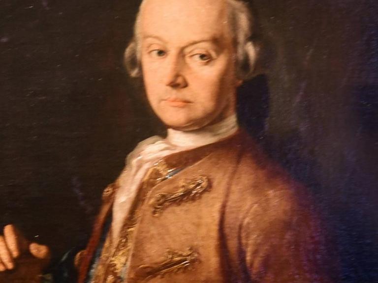 Historisches Porträt eines Mannes mit weißer Perücke.