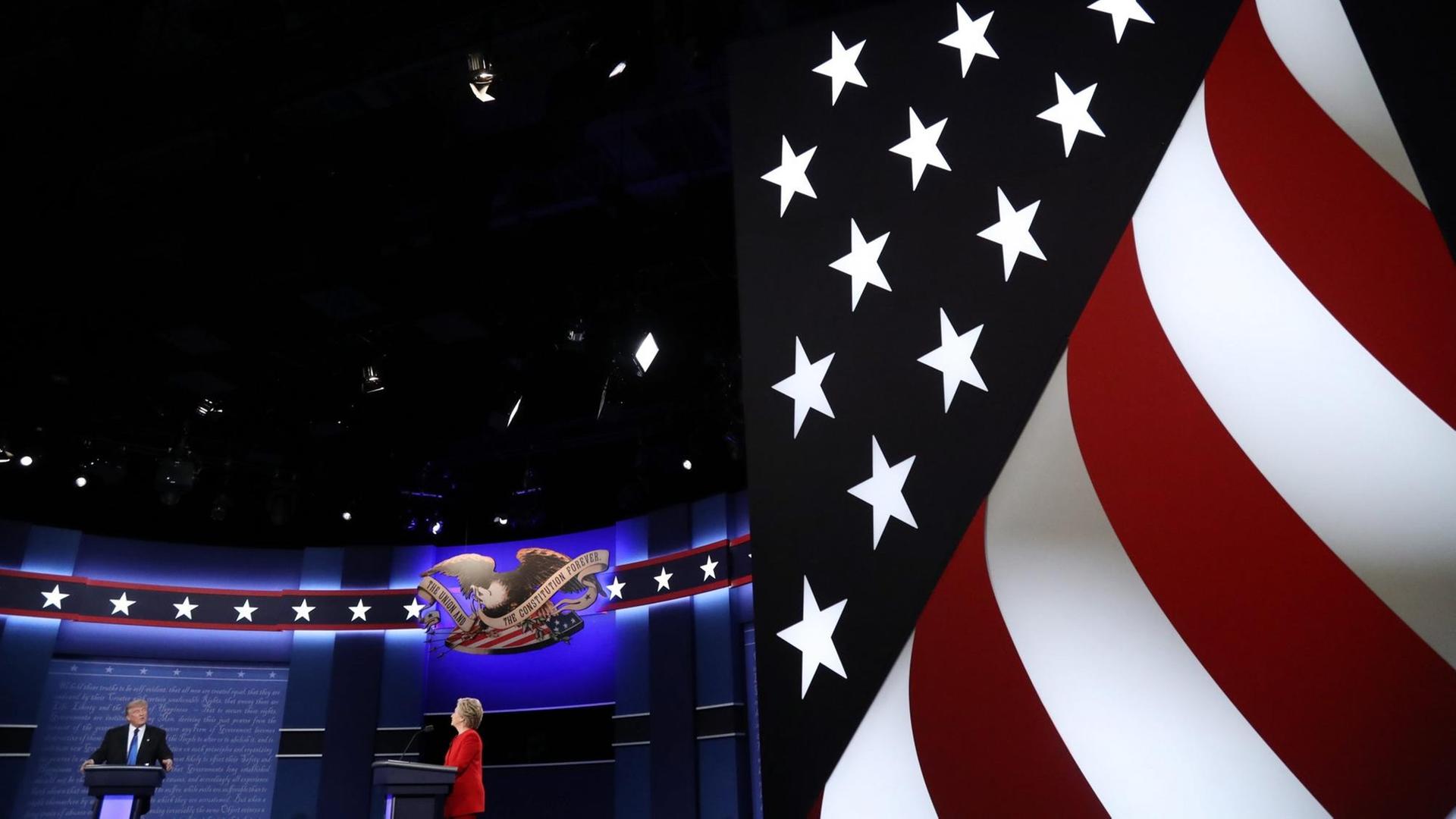 epa05557692 Republican Donald Trump (L) and Democrat Hillary Clinton (R) debate during the first Presidential Debate at Hofstra University in Hempstead, New York, USA, 26 September 2016. The only Vice Presidential debate will be held on 04 October in Virginia, and the second and third Presidential Debates will be held on 09 October in Missouri and 19 October in Nevada. EPA/ANDREW GOMBERT | epa05557692 Republican Donald Trump (L) and Democrat Hillary Clinton (R) debate during the first Presidential Debate at Hofstra University in Hempstead, New York, USA, 26 September 2016. The only Vice Presidential debate will be held on 04 October in Virginia, and the second and third Presidential Debates will be held on 09 October in Missouri and 19 October in Nevada. EPA/ANDREW GOMBERT |