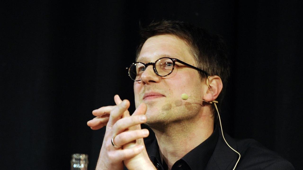 Der Autor Jan Wagner bei einer Lesung in Köln, März 2014 Der Autor Jan Wagner bei einer Lesung in Köln, März 2014