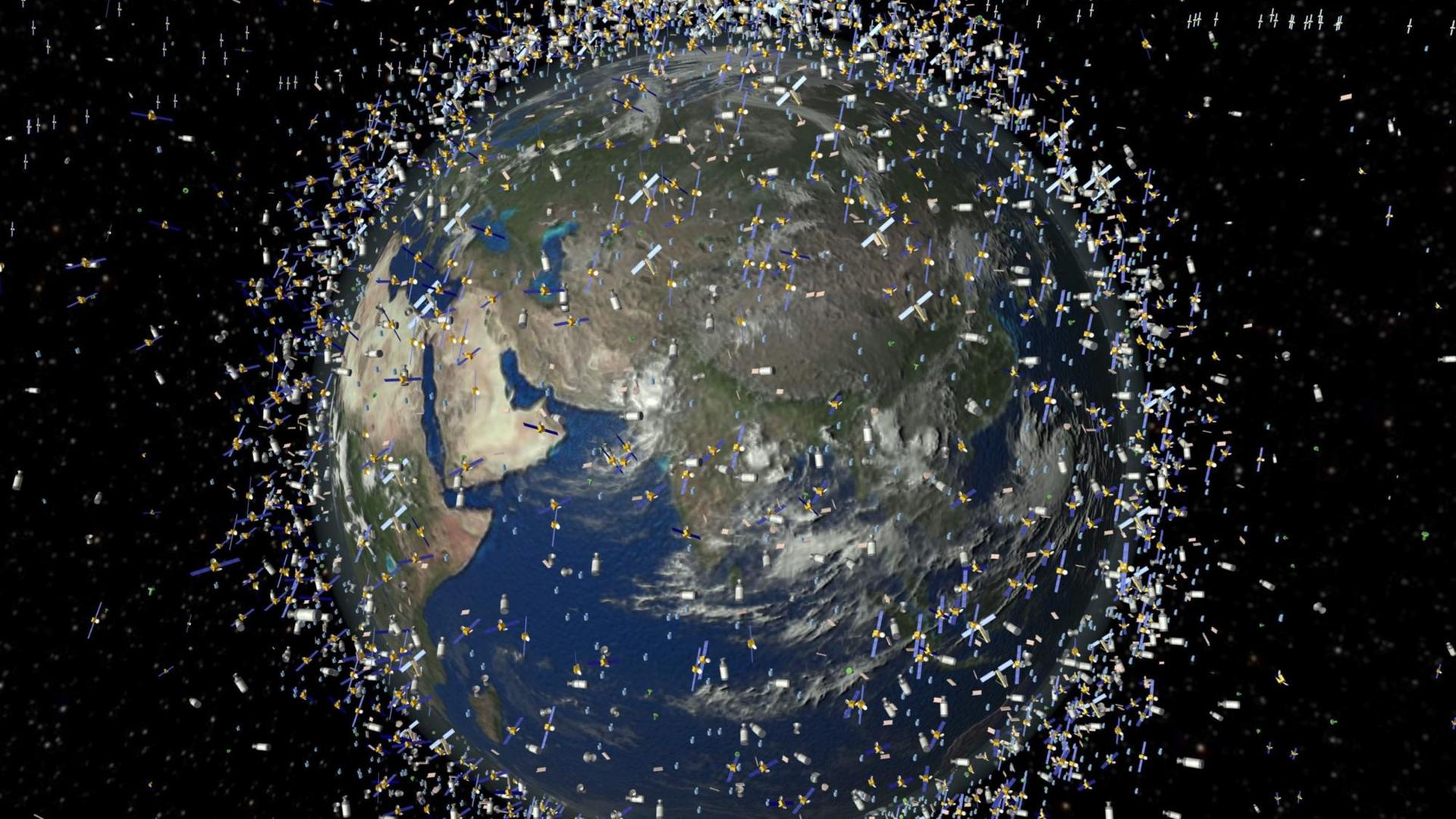 Die Computersimulation der Europäischen Weltraumorganisation ESA nach Daten vom Februar 2009 zeigt Weltraumschrott in der erdnahen Umlaufbahn über dem Äquator. Die Computersimulation der Europäischen Weltraumorganisation ESA nach Daten vom Februar 2009 zeigt Weltraumschrott in der erdnahen Umlaufbahn über dem Äquator.