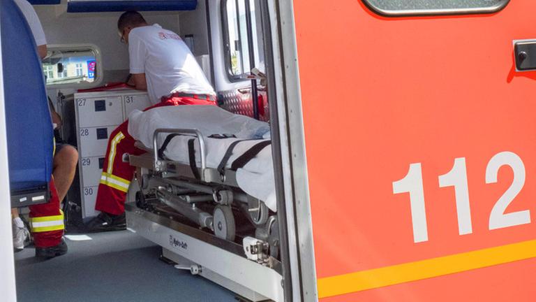 Sanitäter betreuen in einem Rettungswagen der Berliner Feuerwehr einen Patienten Rettungsdienst der Berliner Feuerwehr Medics Betreuen in a Ambulance the Berlin Fire brigade a Patients Rescue Service the Berlin Fire brigade Sanitäter betreuen in einem Rettungswagen der Berliner Feuerwehr einen Patienten Rettungsdienst der Berliner Feuerwehr Medics Betreuen in a Ambulance the Berlin Fire brigade a Patients Rescue Service the Berlin Fire brigade