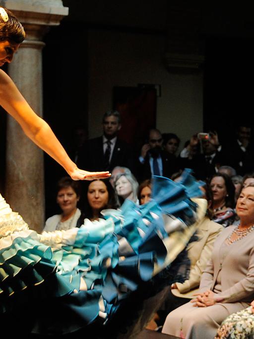 Camilla, wife of Britain's Prince Charles (2ndR) and the Duchess of Alba (R) watch the dancer Cristina Hoyos' (L) flamenco performance during the first official visit to Spain, on April 1, 2011, in Seville.Charles and Camilla -- officially the Prince of Wales and the Duchess of Cornwall - arrived in Madrid on Wednesday from Portugal as part of a three-nation tour that will also take them to Morocco.