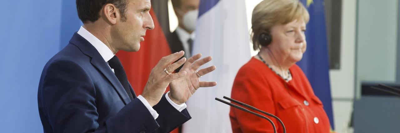 Frankreichs Präsident Macron und die deutsche Kanzlerin Merkel bei einer Pressekonferenz. Frankreichs Präsident Macron und die deutsche Kanzlerin Merkel bei einer Pressekonferenz.