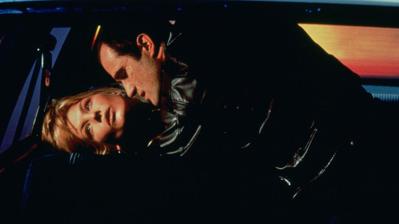 Deborah Kara Unger und Elias Koteas in einer Szene von David Cronenbergs "Crash"