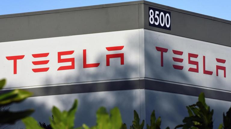 February 13, 2020, Orlando, United States: A Tesla energy warehouse is seen in Florida on the day that Tesla announced it plans to raise approximately $2 billion as part of an offering of common stock. 
