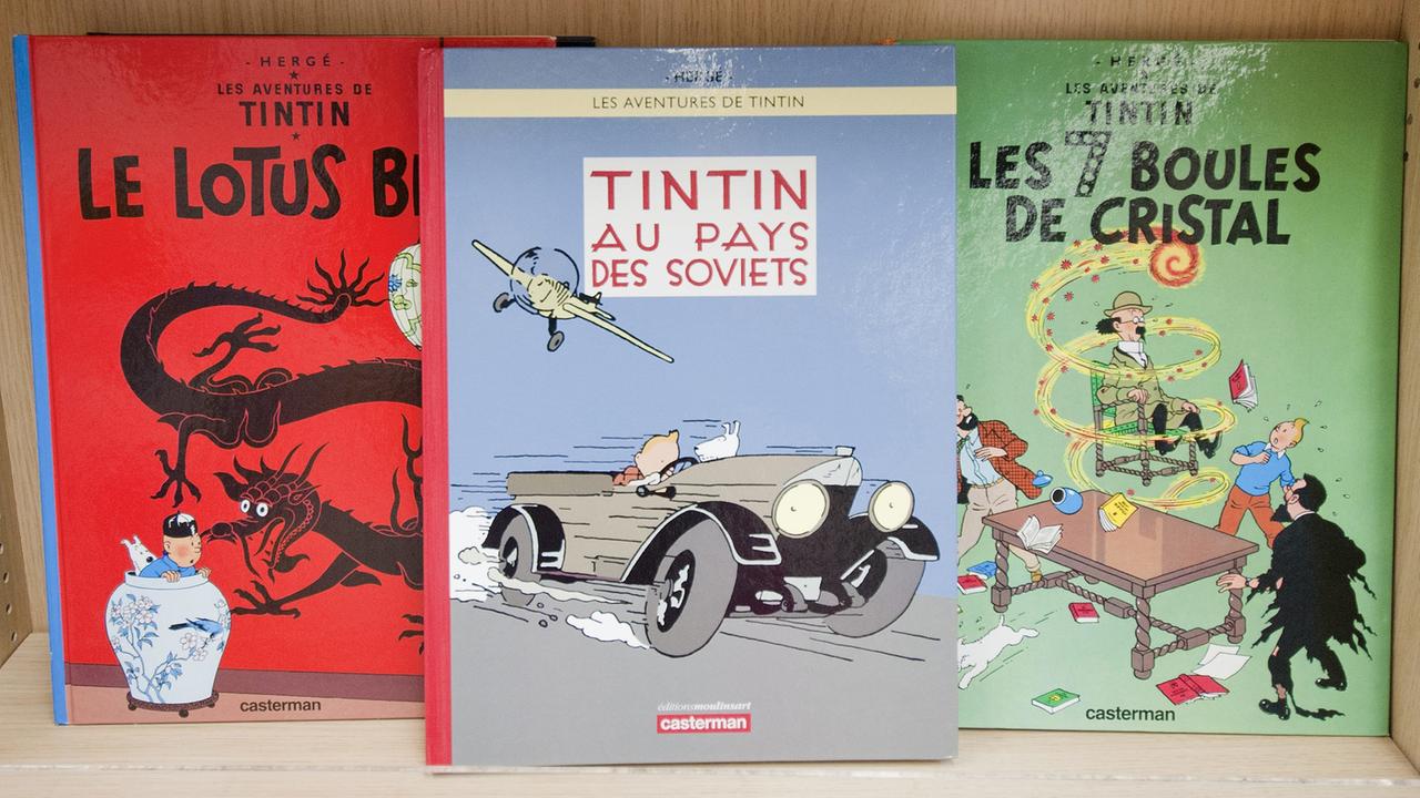 Drei Comicbände der Reihe "Tim & Struppi", darunter Band 1: Tim im Lande der Sowjets. Drei Comicbände der Reihe "Tim & Struppi", darunter Band 1: Tim im Lande der Sowjets.