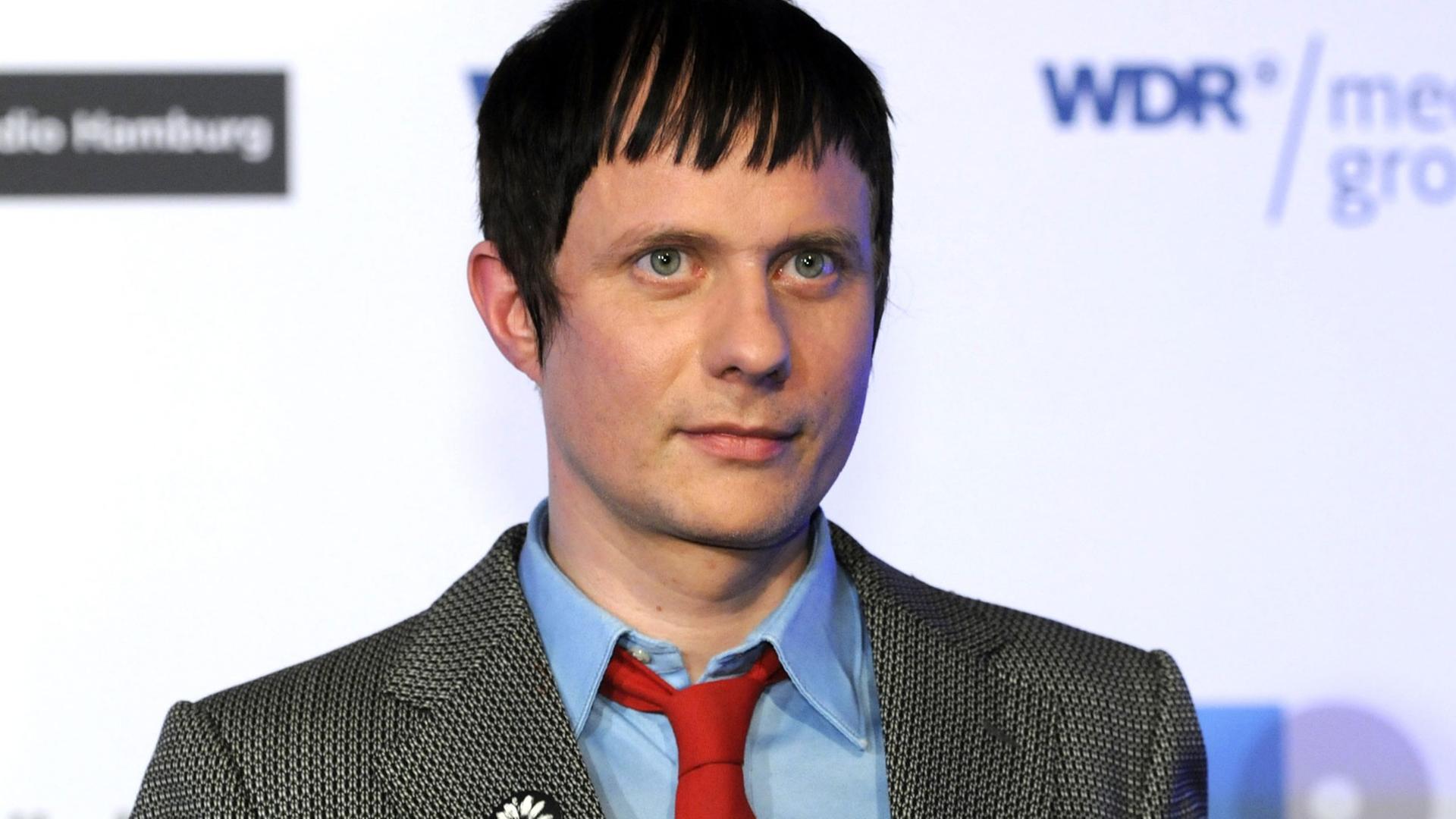 Der Musiker und Hörspielmacher Felix Kubin posiert bei der Verleihung des Deutschen Hörbuchpreises 2014. Der Musiker und Hörspielmacher Felix Kubin posiert bei der Verleihung des Deutschen Hörbuchpreises 2014.