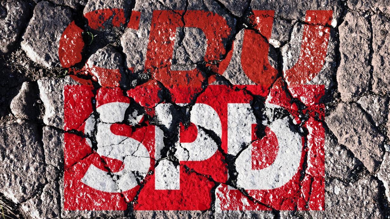 Logos von CDU und SPD auf bröckelnder Wand Logos von CDU und SPD auf bröckelnder Wand