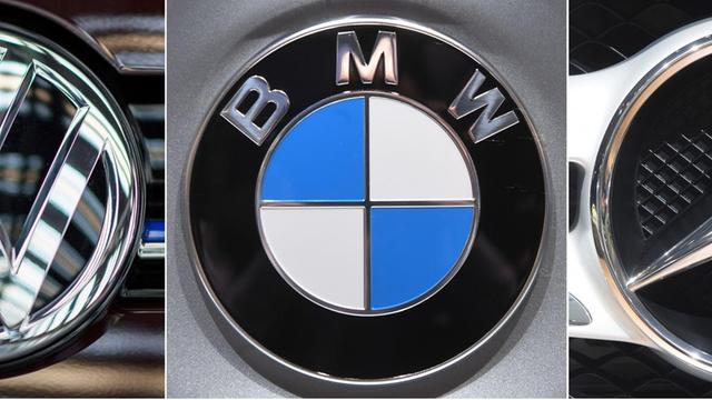 Logos der drei deutschen Autobauer VW, BMW und Daimler