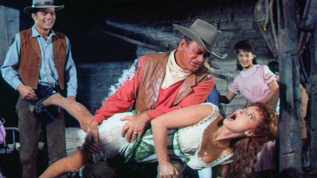 John Wayne in seiner klassischen Rolle in "McLintock – Ein liebenswertes Raubein", einem komödiantischen US-amerikanischen Western von Andrew V. McLaglen aus dem Jahre 1963. John Wayne in seiner klassischen Rolle in "McLintock – Ein liebenswertes Raubein", einem komödiantischen US-amerikanischen Western von Andrew V. McLaglen aus dem Jahre 1963.