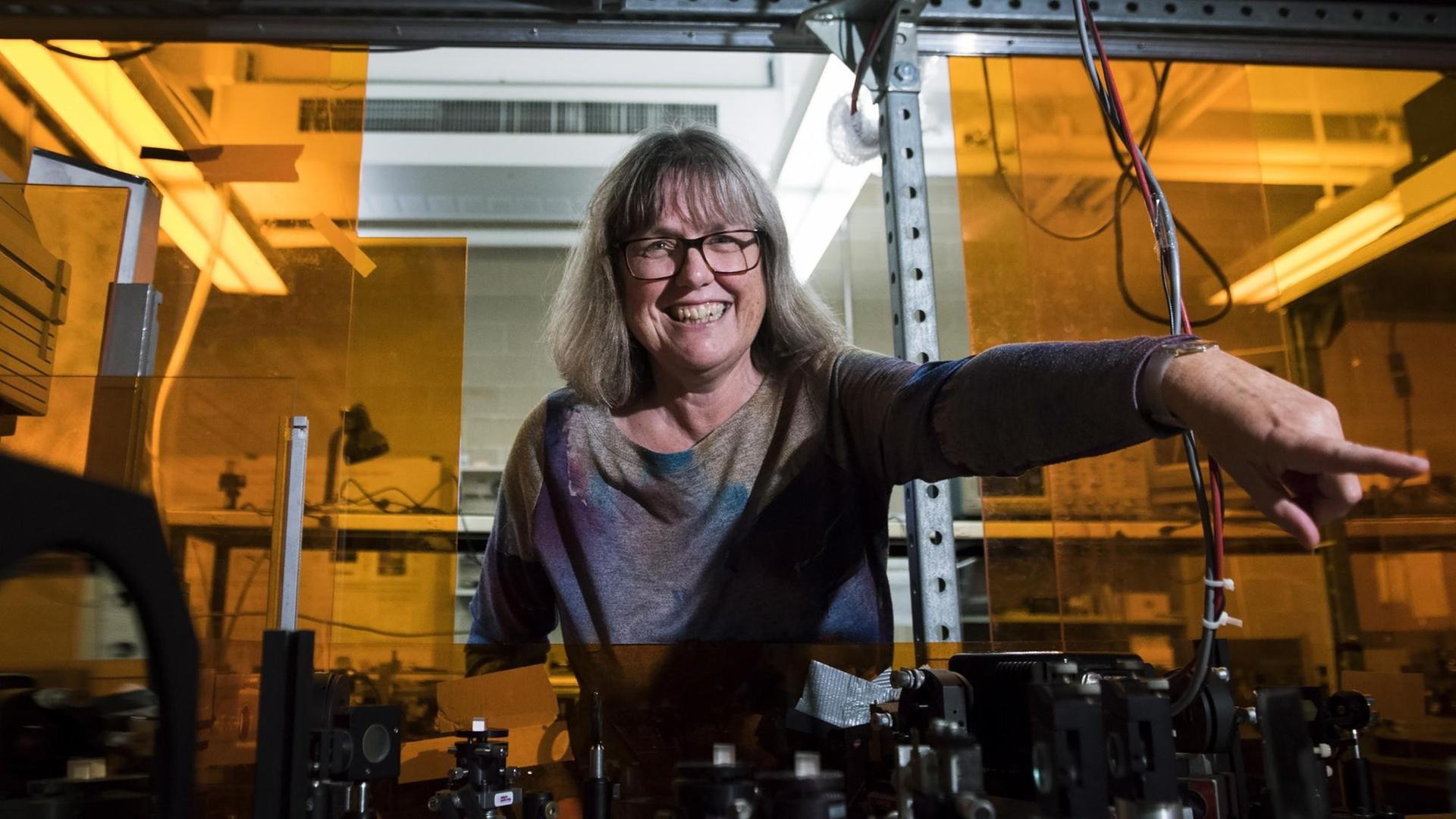 Nobel Prize winner Donna Strickland shows the media her lab after speaking about her prestigious award in Waterloo, Ont., on Tuesday, Oct. 2, 2018. Strickland is among three physicists who were awarded the prize earlier today for groundbreaking inventions in the field of laser physics and also is one of only three women ever to win the Nobel Prize for physics, co-invented a method of generating high-intensity, ultra-short optical pulses which has a variety of applications, including corrective laser eye surgery. (Nathan Denette/The Canadian Press via AP) | Nobel Prize winner Donna Strickland shows the media her lab after speaking about her prestigious award in Waterloo, Ont., on Tuesday, Oct. 2, 2018. Strickland is among three physicists who were awarded the prize earlier today for groundbreaking inventions in the field of laser physics and also is one of only three women ever to win the Nobel Prize for physics, co-invented a method of generating high-intensity, ultra-short optical pulses which has a variety of applications, including corrective laser eye surgery. (Nathan Denette/The Canadian Press via AP) |