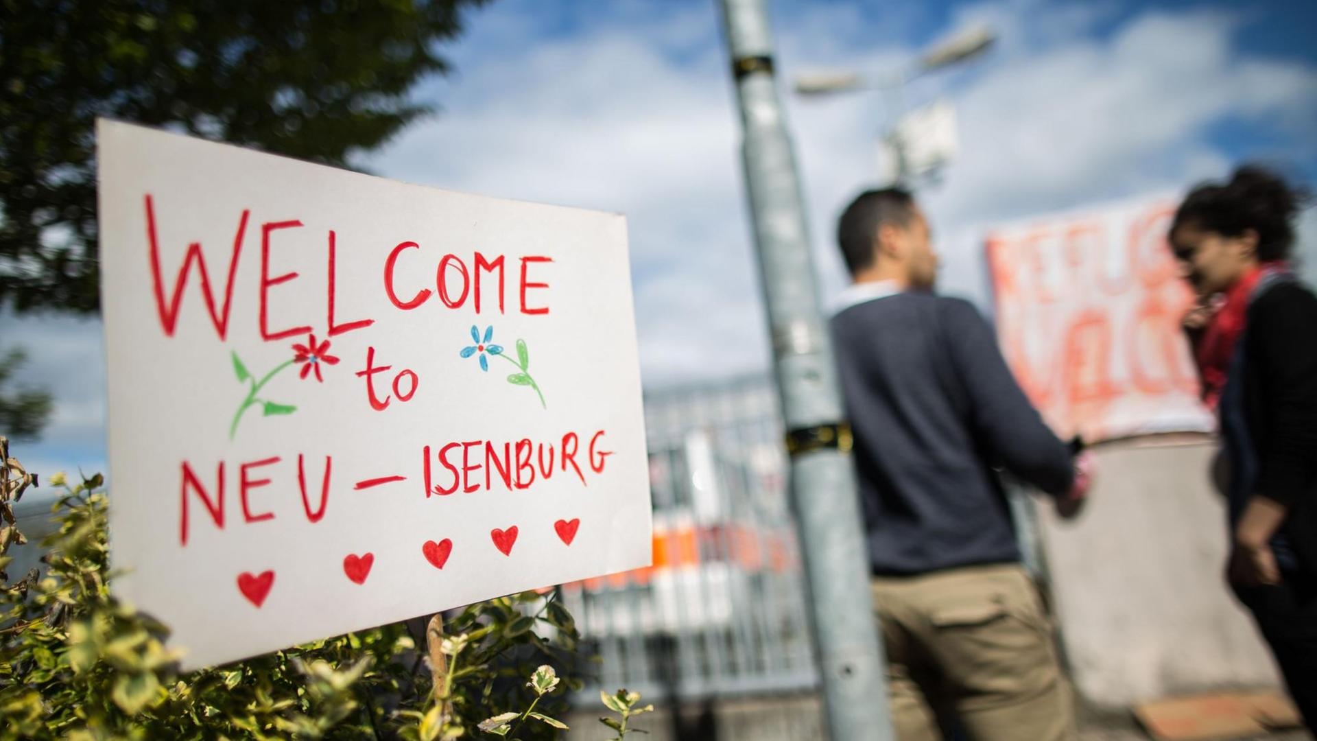 Ein Schild mit der Aufschrift "Welcome to Neu-Isenburg"