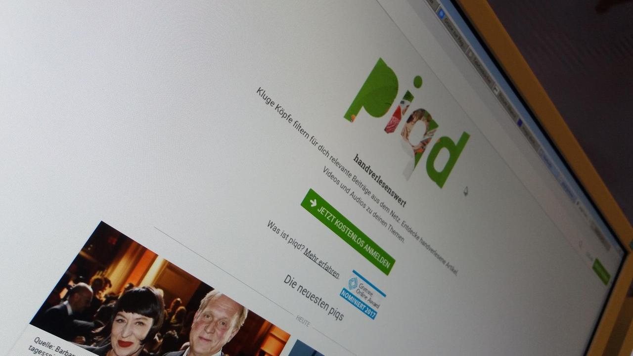 Die Website Piqd auf einem Computerbildschirm Die Website Piqd auf einem Computerbildschirm