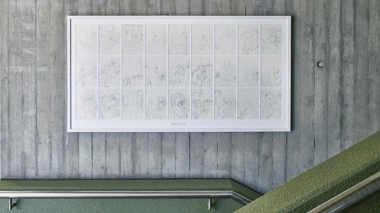 Gerahmte Zeichnungen des NSU-Prozesses hängen an einer Wand. Gerahmte Zeichnungen des NSU-Prozesses hängen an einer Wand.