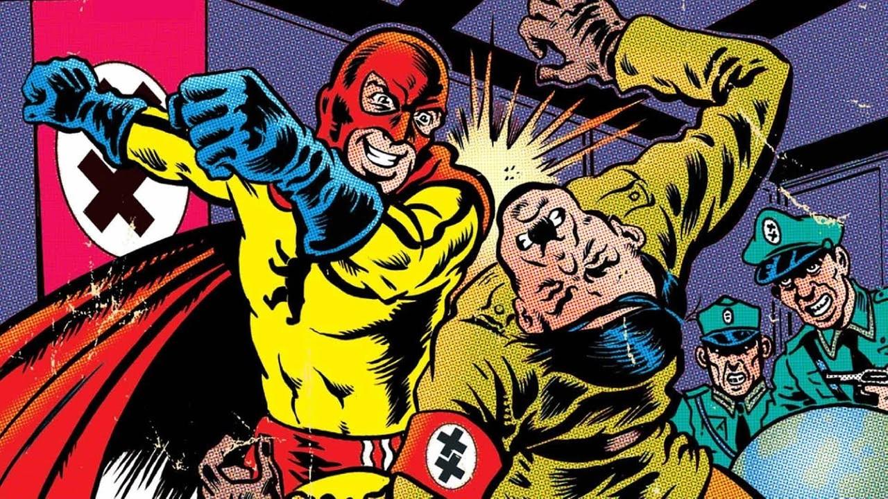 Die Comicfigur Captain Berlin versetzt Adolf Hitler einen Kinnhaken. Die Comicfigur Captain Berlin versetzt Adolf Hitler einen Kinnhaken.