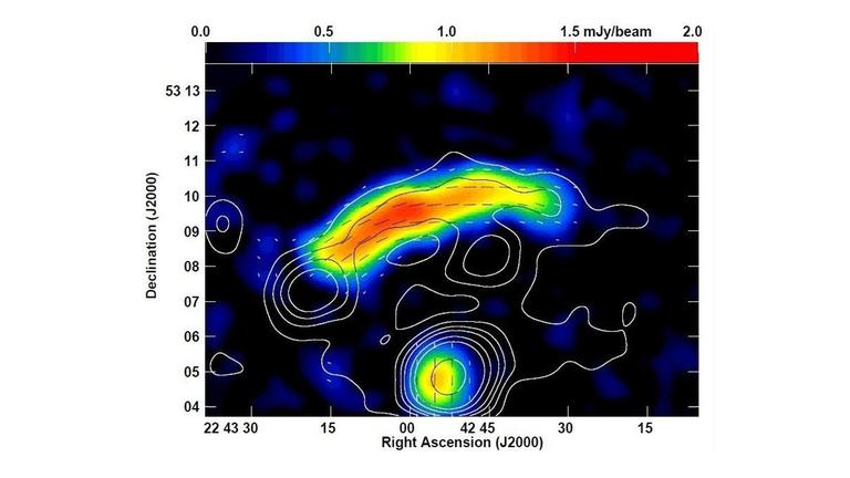 Forscher des Max-Planck-Instituts für Radioastronomie fanden die bislang größten Magnetfeldstrukturen im Kosmos. Forscher des Max-Planck-Instituts für Radioastronomie fanden die bislang größten Magnetfeldstrukturen im Kosmos.