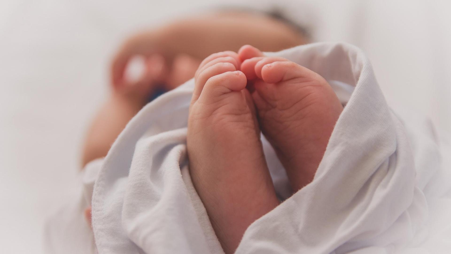 Füße eines Babys. Füße eines Babys.
