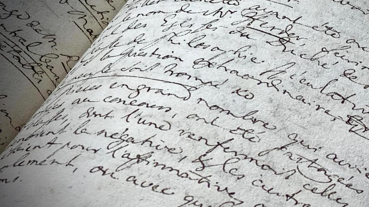 Eine handschriftlich beschriebene Seite. Eine handschriftlich beschriebene Seite.