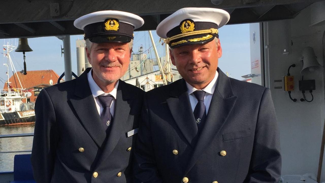 Porträt von Kapitän Thorsten Rahder und Bootsmann Harald Kallas Porträt von Kapitän Thorsten Rahder und Bootsmann Harald Kallas