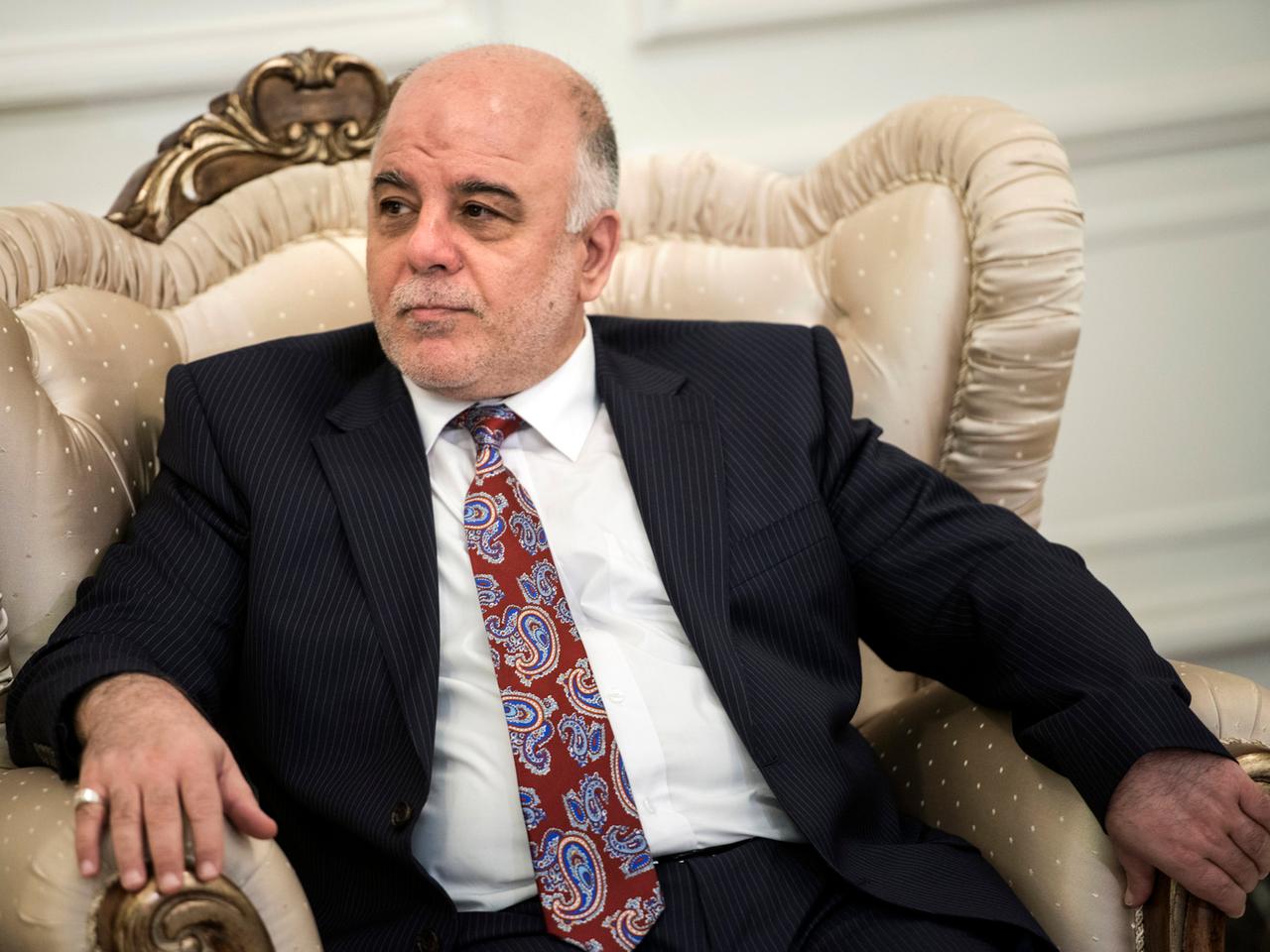 Der neue irakische Ministerpräsident Haider al-Abadi bei einem Treffen mit US-Außenminister John Kerry am 10. September 2014 in Bagdad.