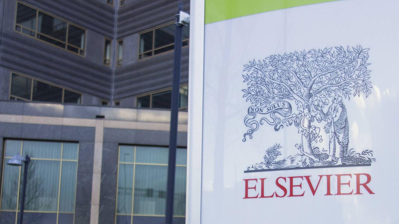 Eingangsschild vor einem Bürogebäude von Elsevier und anderen Unternehmen Eingangsschild vor einem Bürogebäude von Elsevier und anderen Unternehmen