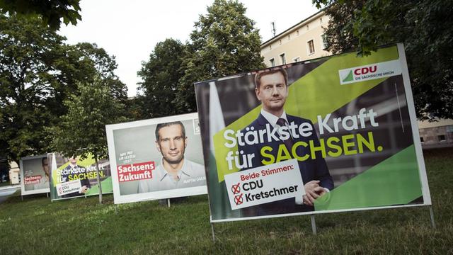 Wahlplakat von CDU Ministerpraesident und CDU Spitzenkandidat Michael Kretschmer und SPD Kandidat Martin Dulig in Chemintz, zur Landtagswahl in Sachsen