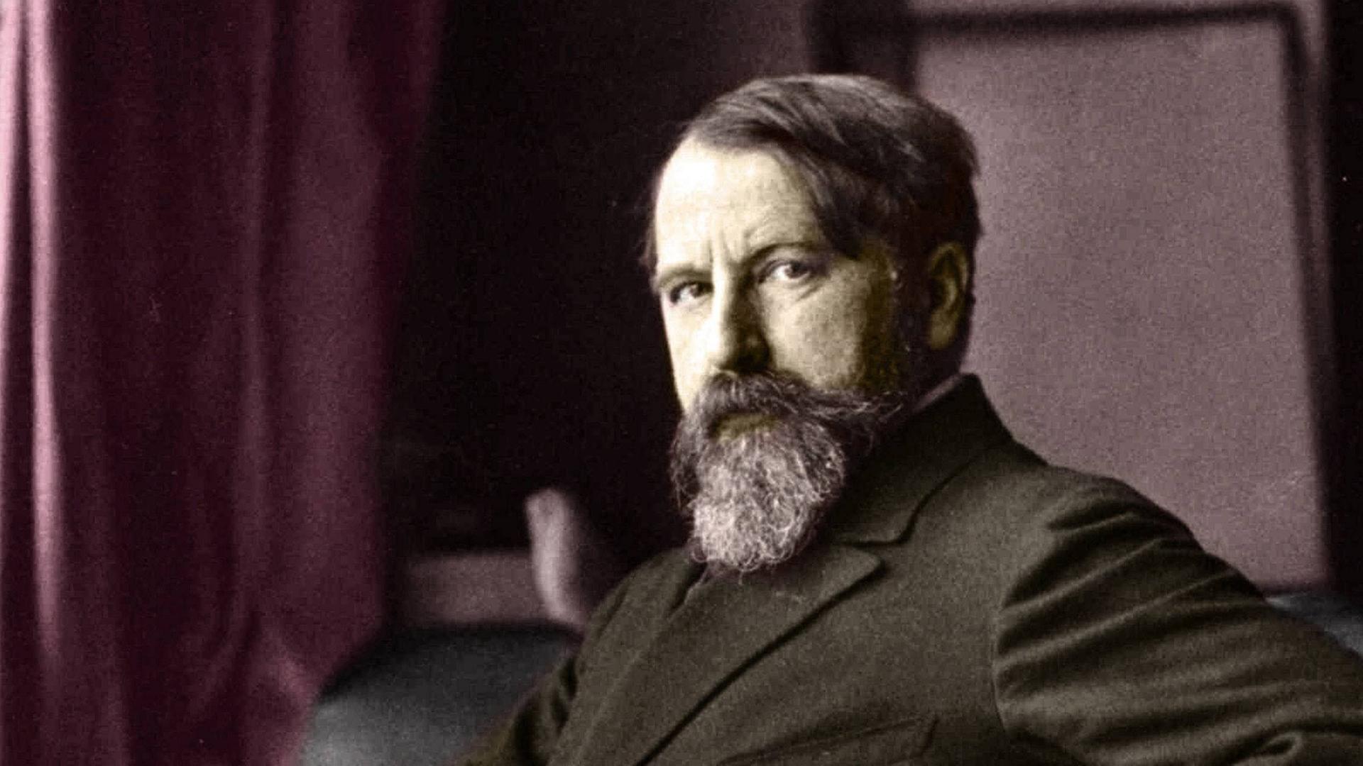 Zeitgenössisches Porträt von Arthur Schnitzler im Anzug, in selbstbewusster Pose mit der Hand in die Hüfte gestemmt. Zeitgenössisches Porträt von Arthur Schnitzler im Anzug, in selbstbewusster Pose mit der Hand in die Hüfte gestemmt.