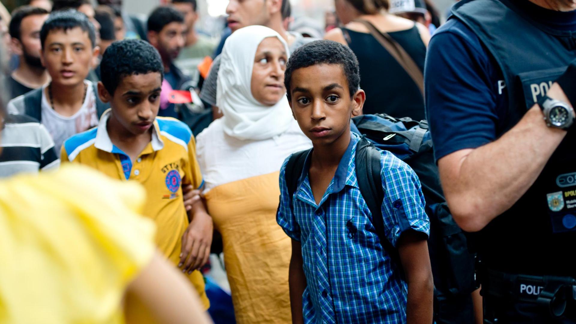 Eine syrische Familie am 1.9.2015 in München am Hauptbahnhof Eine syrische Familie am 1.9.2015 in München am Hauptbahnhof